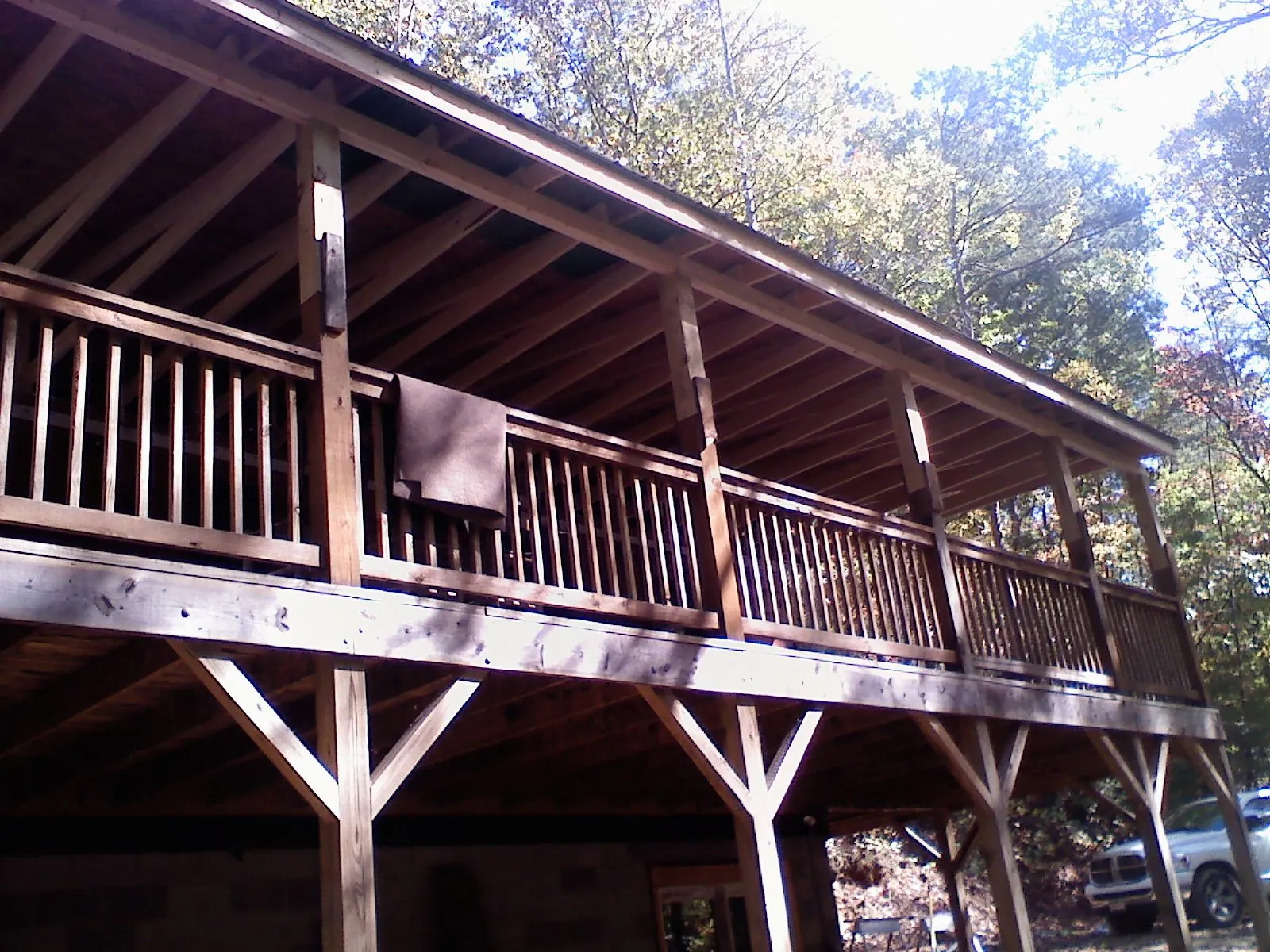 Timber framing under a new elevated porch and deck — Roof Leak Repair in Lake Geneva by Roofing Brothers